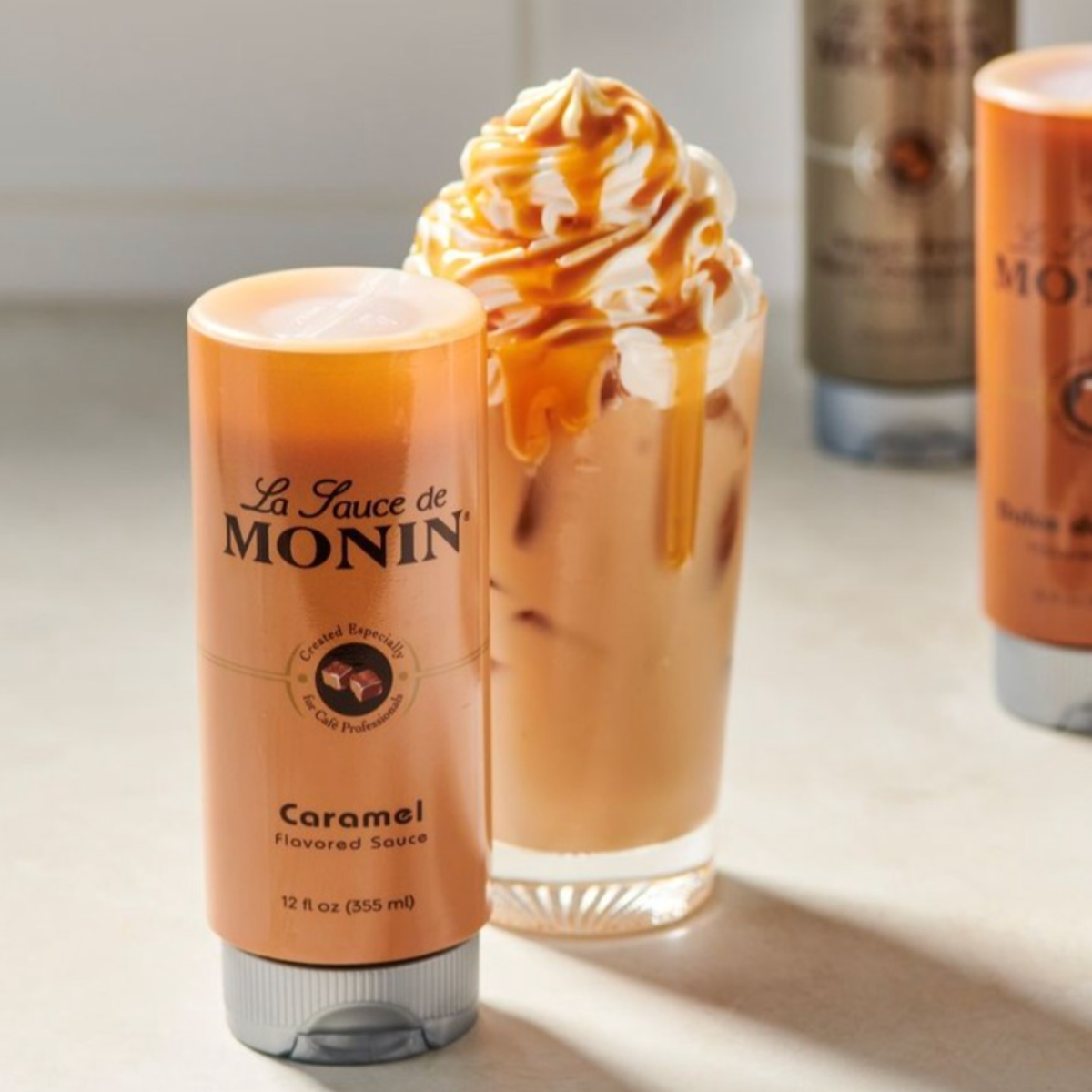 Sauce Monin chocolat et caramel pour café et desserts