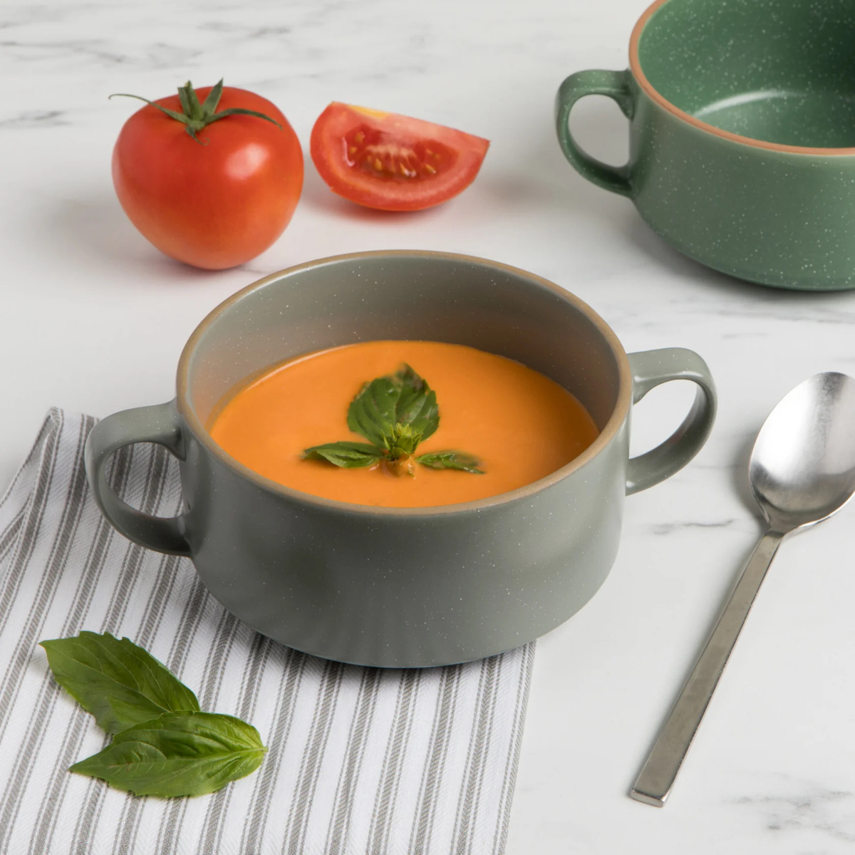 Bol à soupe gris en grès vue complète sur table
