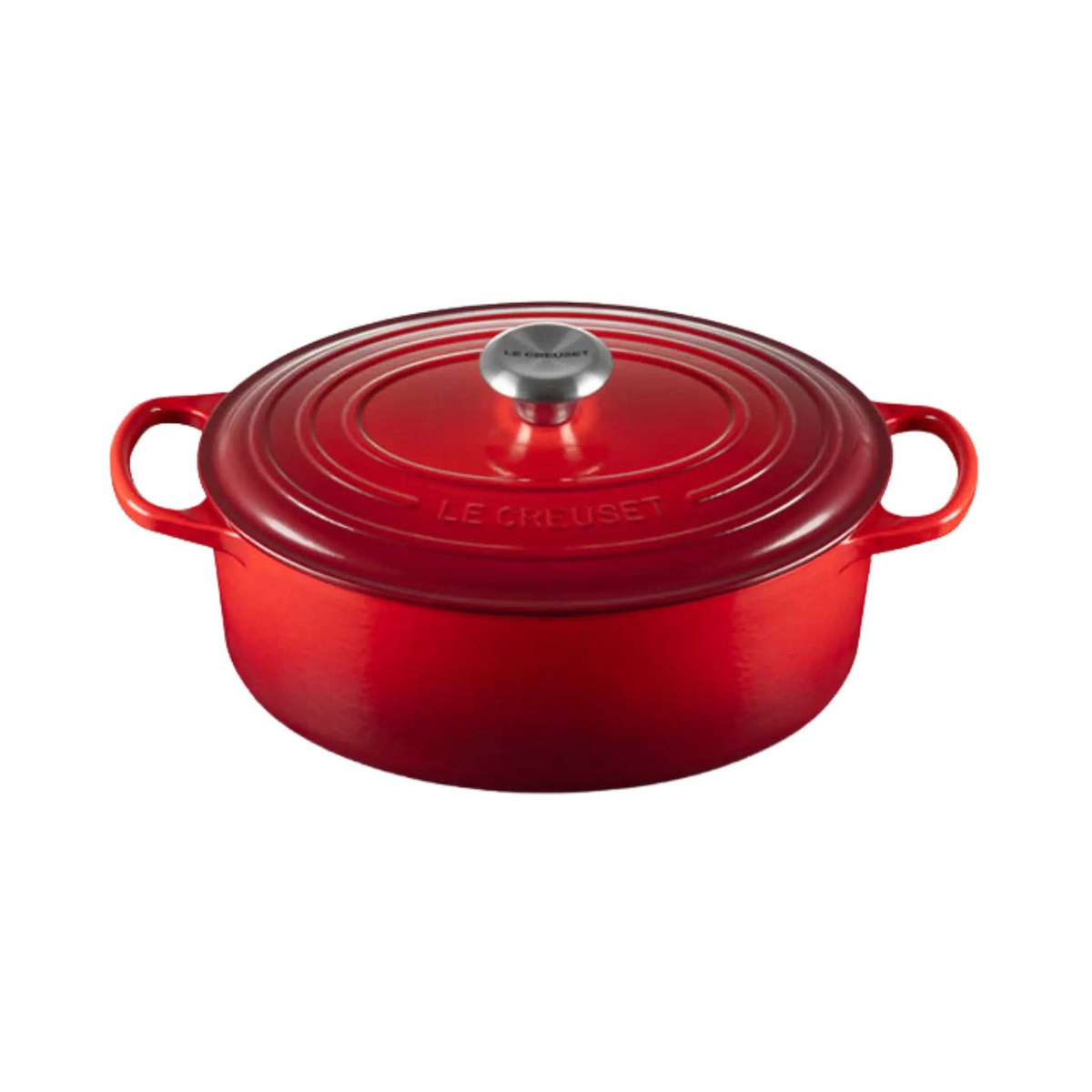 Cocotte ovale Cerise Le Creuset en fonte émaillée rouge pour cuisson uniforme des viandes et volailles.